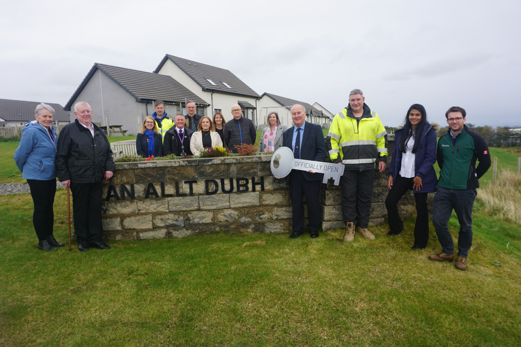 Front (L-R): Dena Macleod (HHP Chief Executive), Calum Mackay (HHP Chair), Duncan Macinnes (HHP Board Member & Ward Councillor), Roddy Finlayson (CalMax), Sawan Morrison (HHP), Ryan Macsween (TIG) Back Row (L-R): Lorraine Graham (CNES), James Mackinnon (CalMax) (Kevin Poke HHP), Gordon Murray (Ward Councillor), Kaleigh Macleod, Newmarket Playpark Group), Sharon Ried Newmarket Playpark Group), John Angus Macdonald (HHP), Johanna Morrison (CNES)